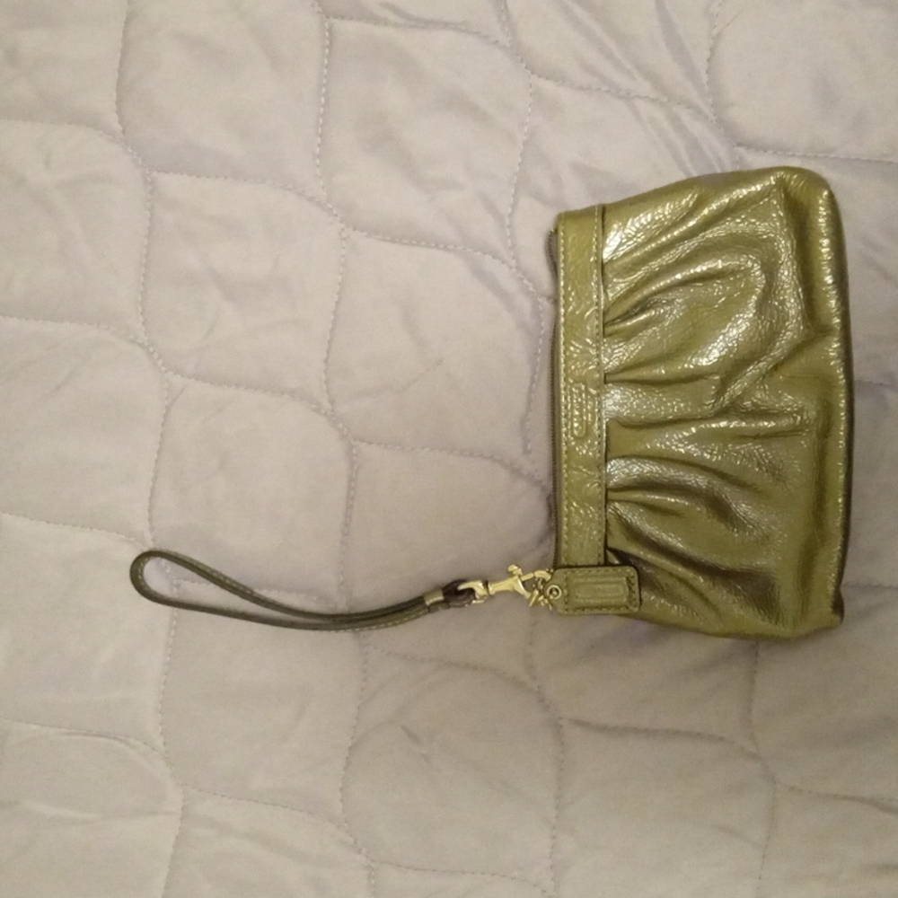 Vintage Like new Coach Wristlet with detachable strap.  Gun metal gray color.